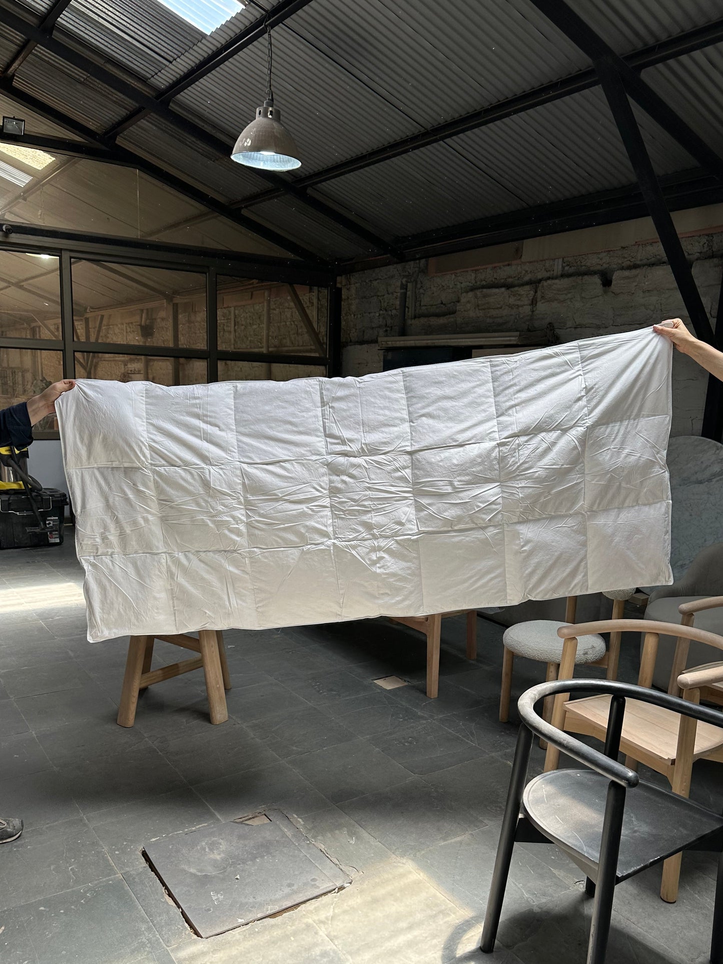 Piecera rellena de plumas