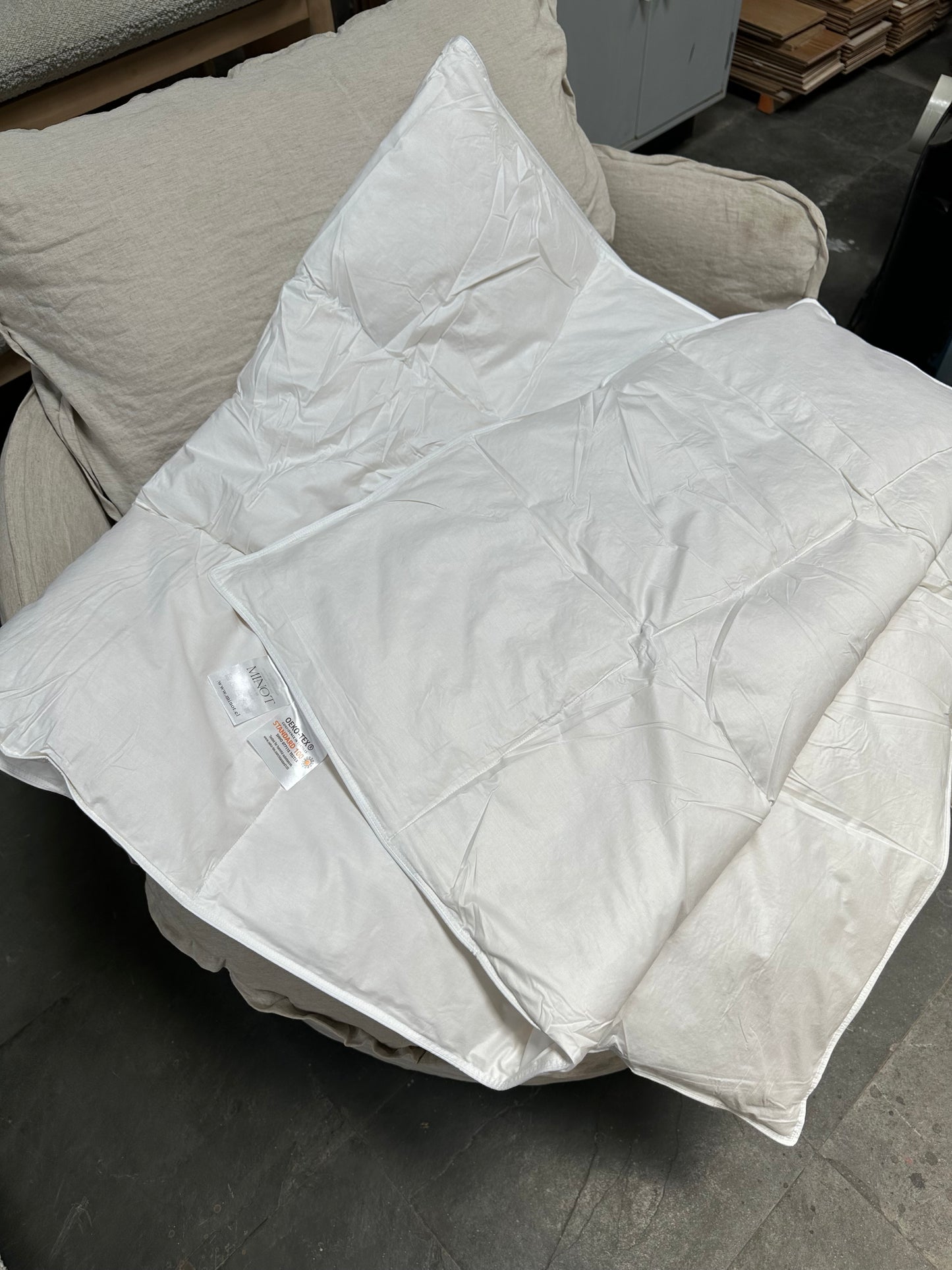 Piecera rellena de plumas