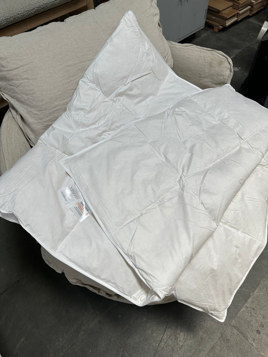 Piecera rellena de plumas