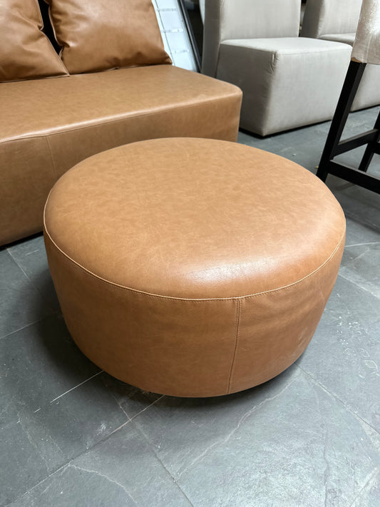 Sofá eco-cuero con pouf